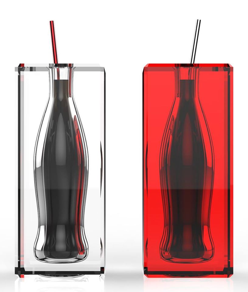 Coca-Cola bottle inside glass in red and white