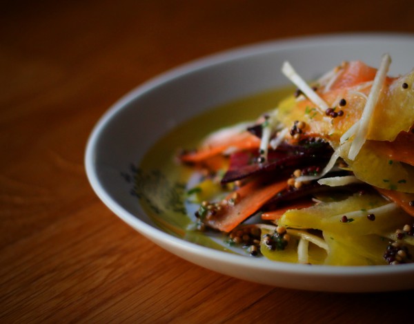 Root vegetable salad with mustard seeds and vinegar
