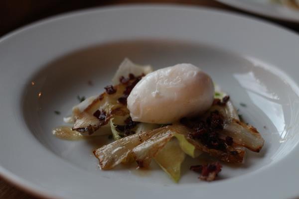 Poached egg with Endives, Bacon, Butter and Thyme