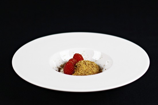 Chocolate mousse with white chocolate crumble and raspberries