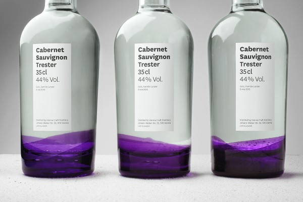 Bottles dipped in Paint for the Edelbrand Series Packaging