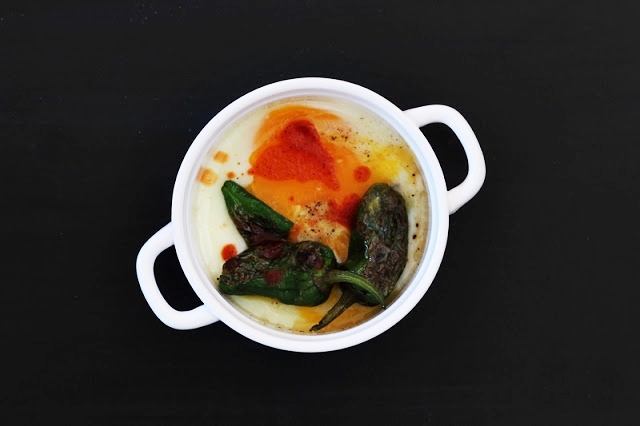 Baked Egg with Pimientos de Padron and Hot Sauce