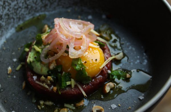 Asian Beef Tartare with Cilantro Mayonnaise, Cashews and Egg Yolk Confit