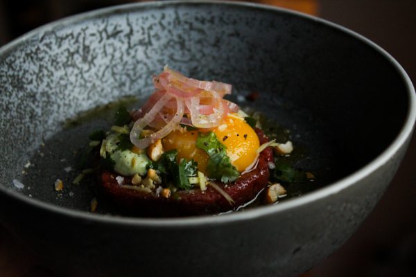 Asian Beef Tartare with Cilantro Mayonnaise, Cashews and Egg Yolk Confit