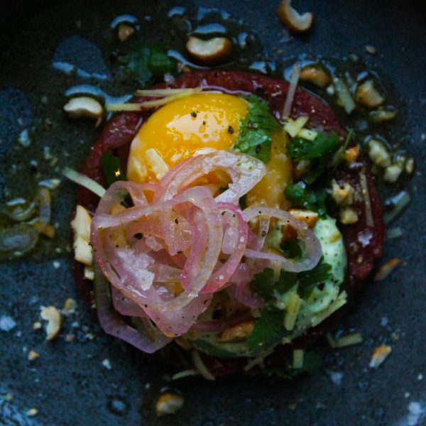 Asian Beef Tartare with Cilantro Mayonnaise, Cashews and Egg Yolk Confit