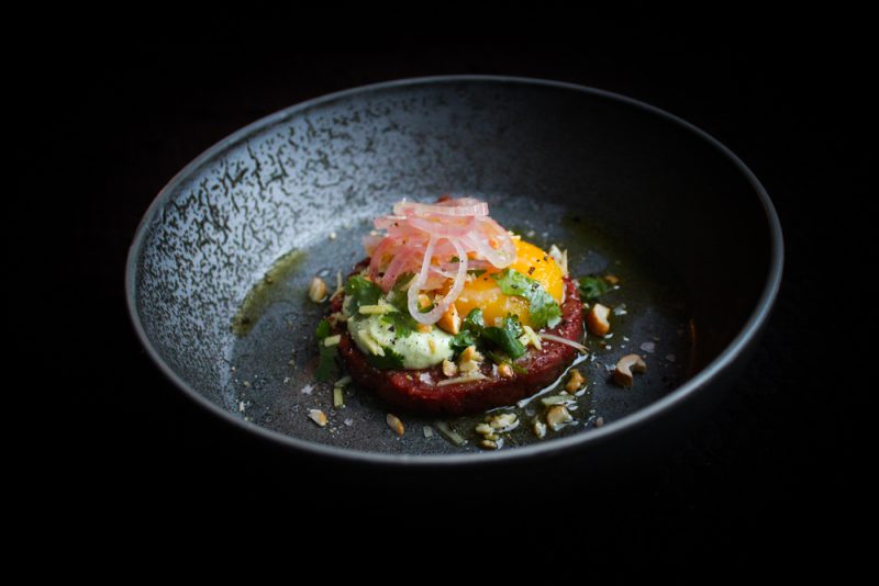 Asian Beef Tartare with Cilantro Mayonnaise, Cashews and Egg Yolk Confit