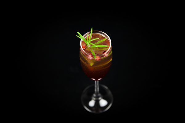 Pomegranate Champagne Cocktail with Rosemary