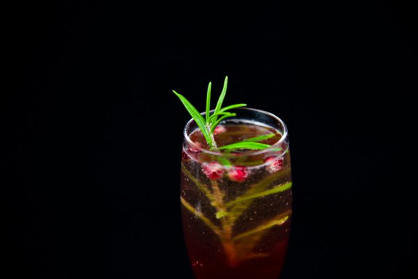 Pomegranate Champagne Cocktail with Rosemary