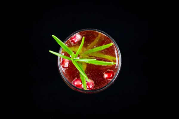 Pomegranate Champagne Cocktail with Rosemary