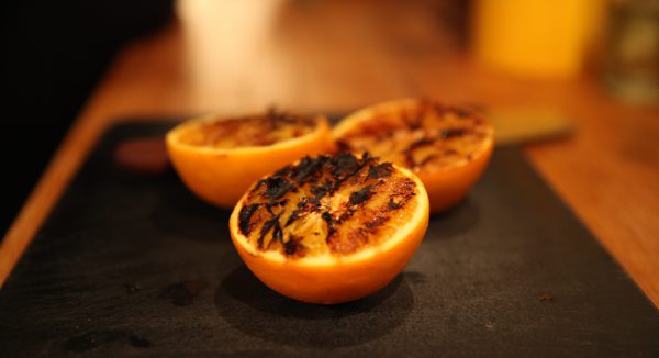 Grilled Orange Old Fashioned With Orange Chips and Campari