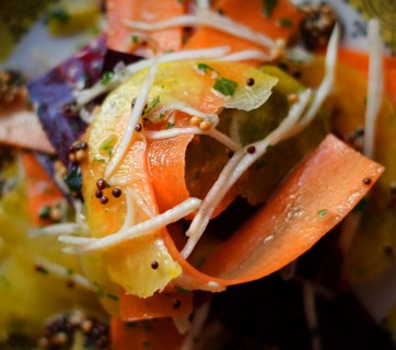 Root vegetable salad with mustard seeds and vinegar