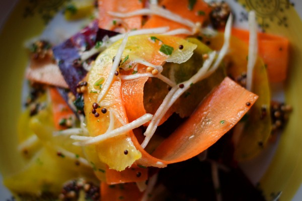 Root vegetable salad with mustard seeds and vinegar