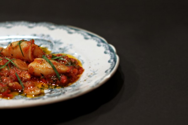 Braised calamari with tomatoes, chili and garlic