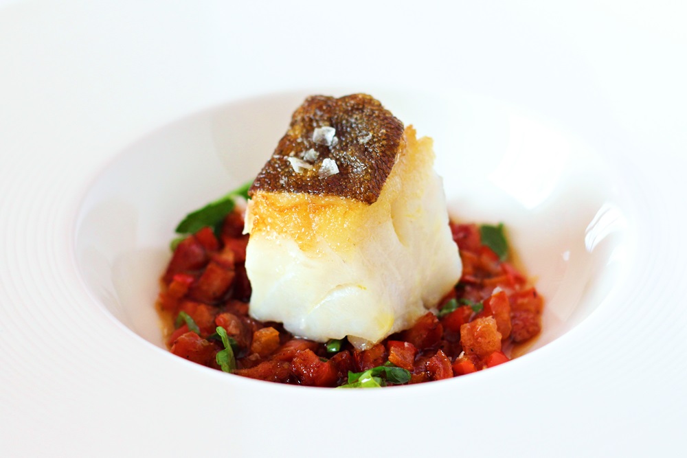 Seared cod with Italian Salsiccia and Tomatoes