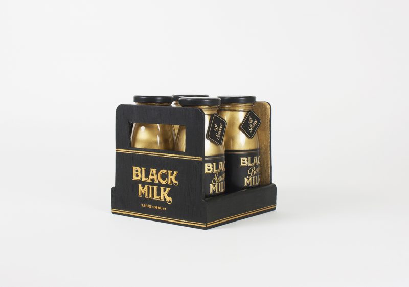 Great Golden and Black Bottle Packaging Design