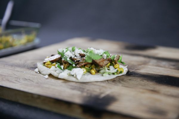 Pork Collar Taco with Chipotle Corn Salsa, Cilantro Sauce and Feta Cheese